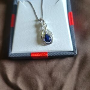 Lab created blue sapphire necklace. Sterling silver chain. Never worn